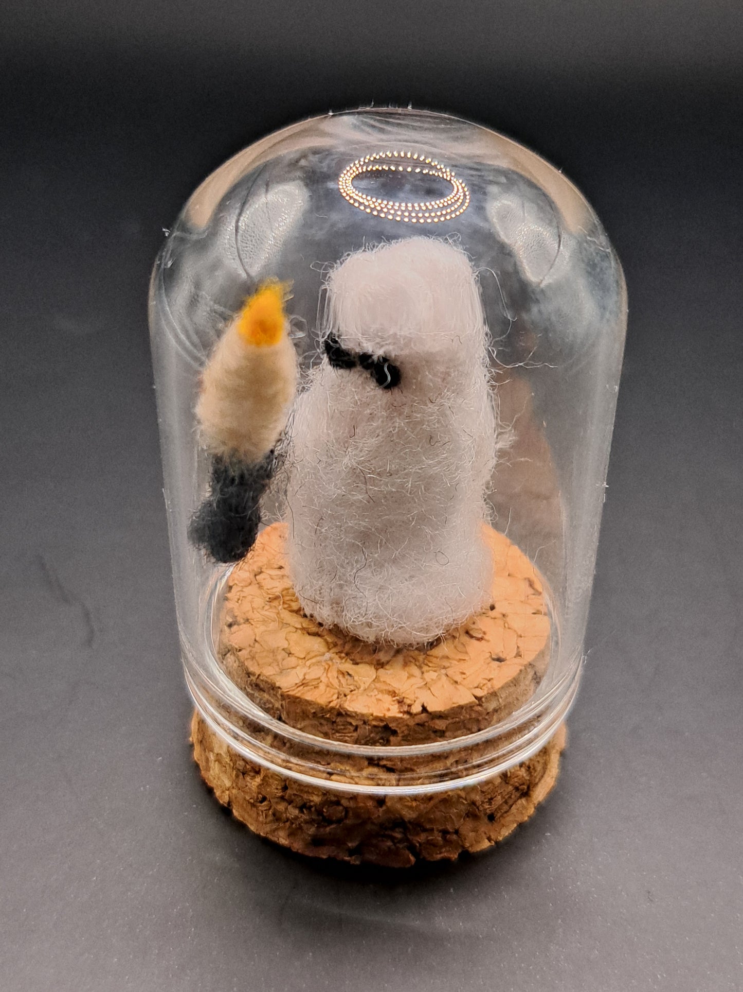 'Are you afraid of the dark' Needle felted ghost holding a candle
