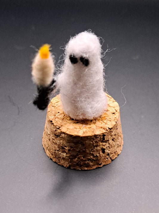 'Are you afraid of the dark' Needle felted ghost holding a candle