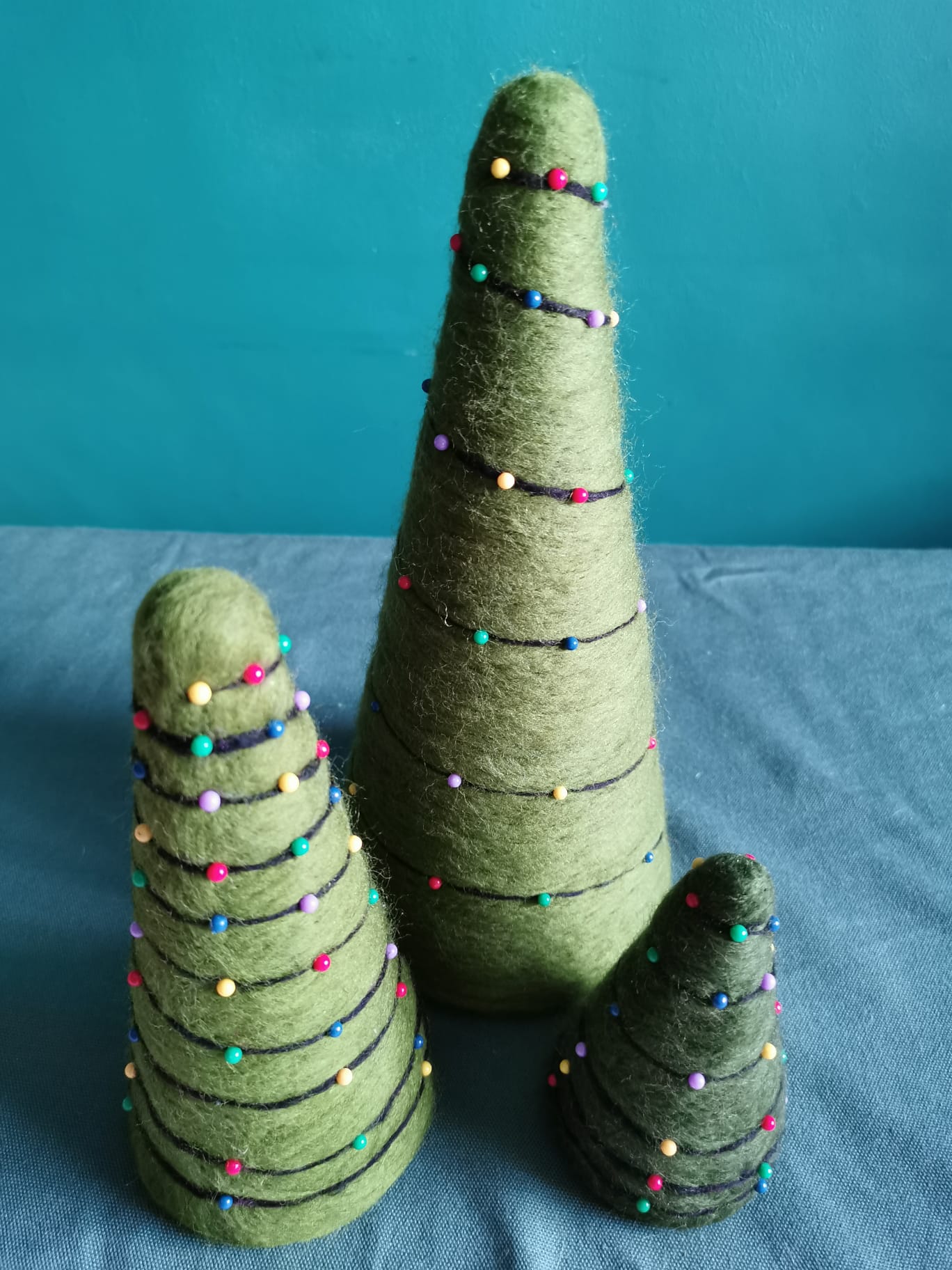 Needle felted Christmas tree pincushions